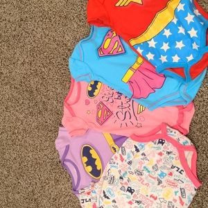 Never worn! 5 superhero onesies